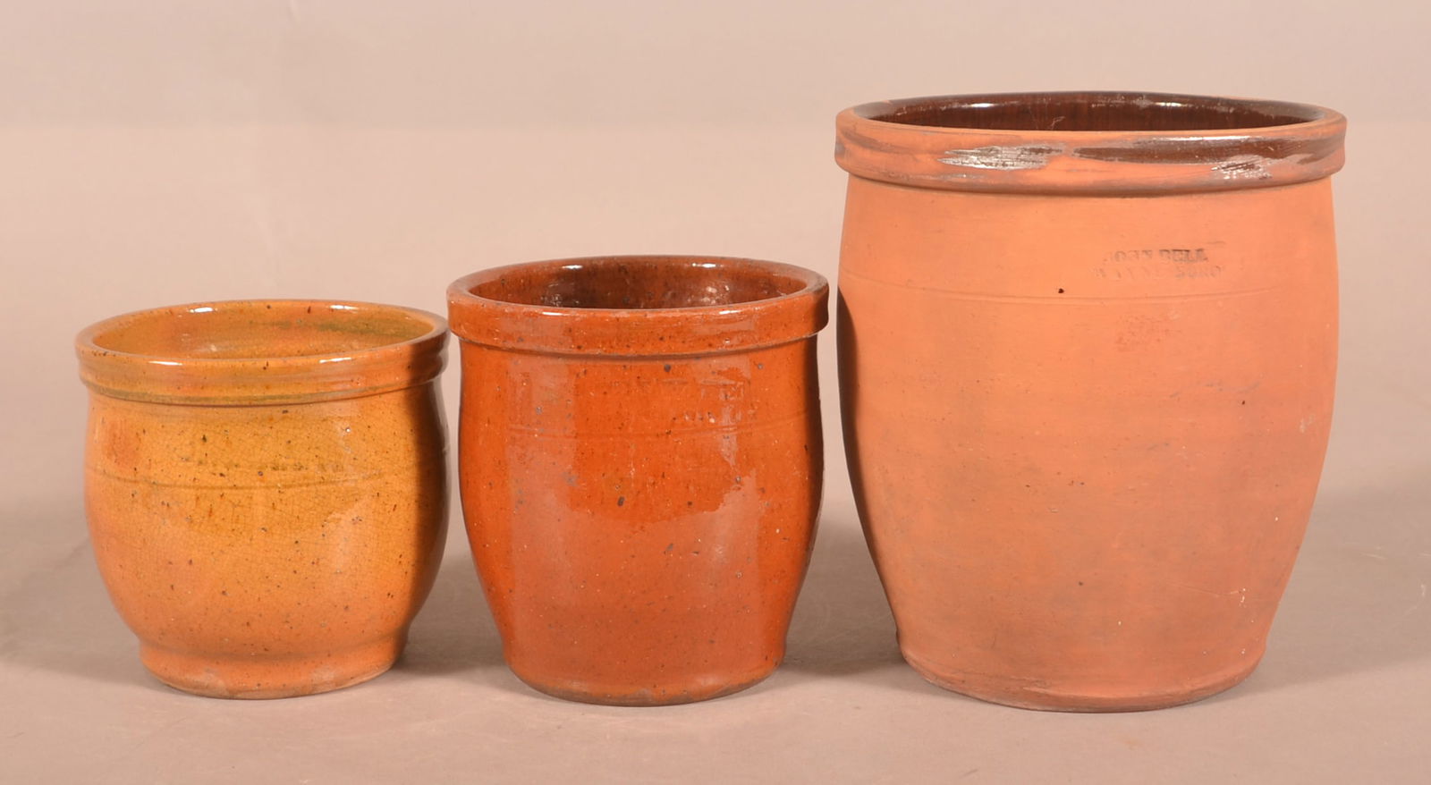 Three John Bell, Waynesboro, PA Redware Crocks.: Three John Bell, Waynesboro, PA Redware Crocks. 4-3/4" to 8"h. Provenance: The late Ronald E. Hammer, New Oxford, PA.