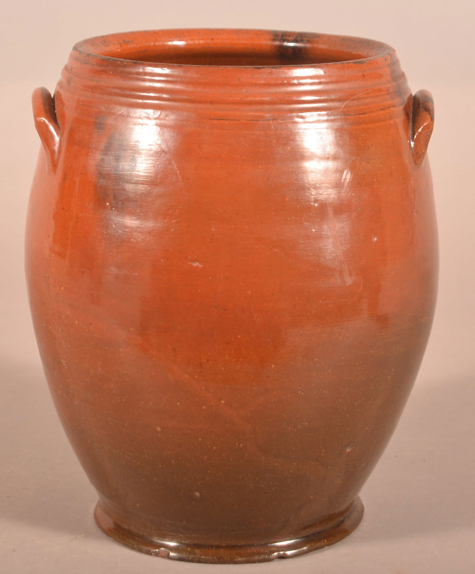 19th Century Bulbous-Form Redware Jar.: 19th Century Bulbous-Form Redware Jar. Manganese brushed on orange ground. 9-1/2"h.