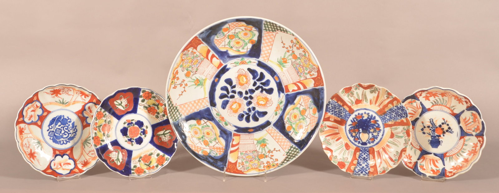 Japanese Imari Porcelain Charger & Four Plates.: Japanese 19th Century Imari Porcelain Charger and Four Plates. Charger 14-1/2" diam., plates 8-1/4" to 8-1/2" diam. Provenance: The late Ronald E. Hammer, New Oxford, PA.