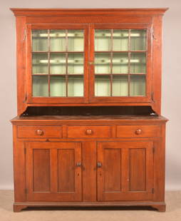 PA Chippendale Walnut 2-Part Dutch Cupboard.: Pennsylvania Chippendale Walnut 2-Part Dutch Cupboard. Cove-molded cornice, two 9-pane glazed upper doors supported by wrought iron rattail hinges. Lower section with three split dovetailed drawers ab