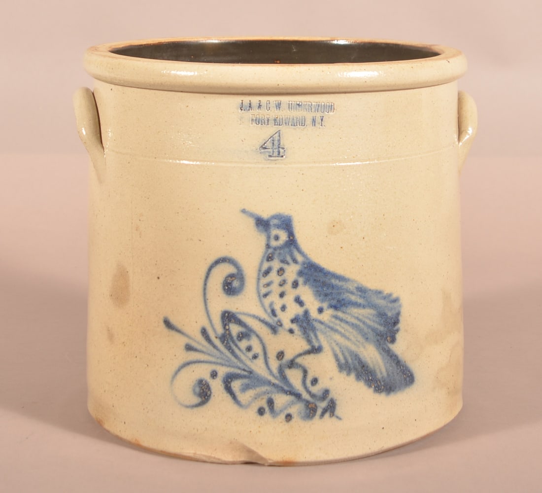 J.A. & C.W. Underwood Fort Edward, NY Crock.: J.A. & C.W. Underwood Fort Edward, NY Storage Crock. Stamped "J.A. & C.W. Underwood Fort Edward, NY." along with the capacity mark of "4". Impressive size. Freehand decoration of a bird on flower with