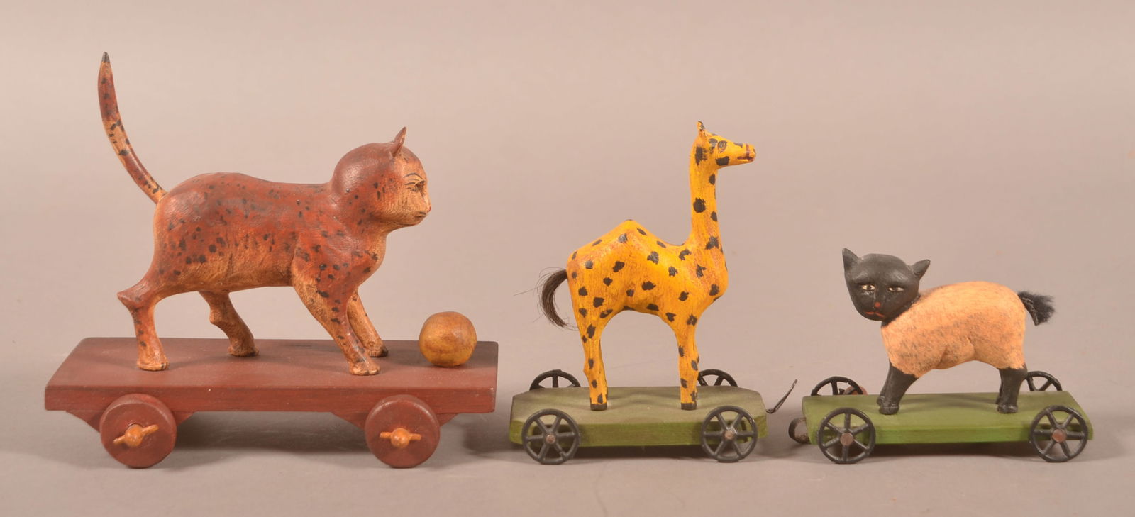 Three Carved Animals on Wheels by Walter Gotshall. (1 of 5)