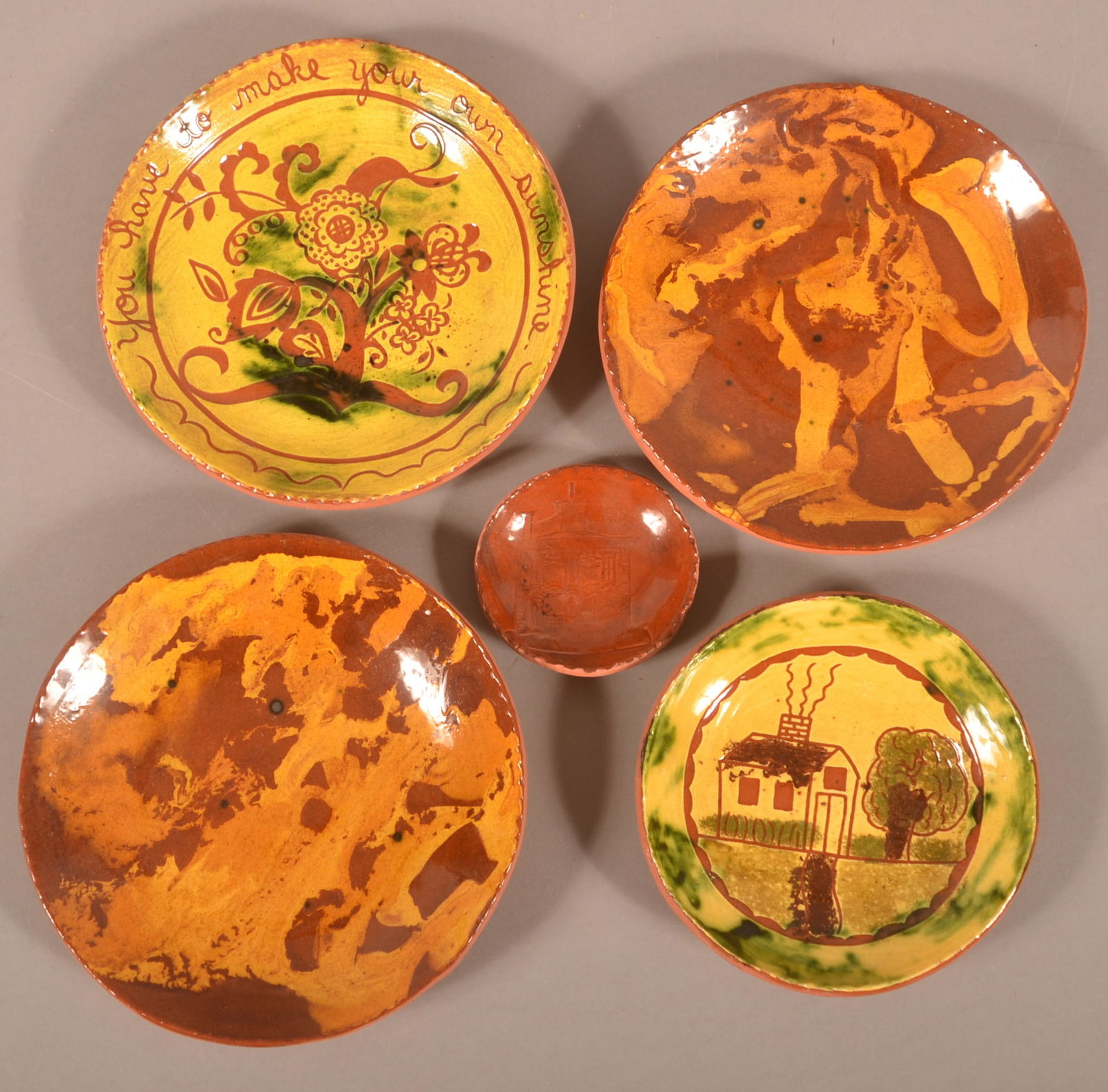 Five Lester Breininger Redware Plates. (1 of 2)