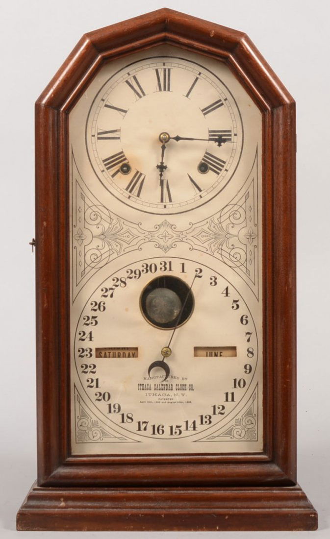 Ithaca Double Dial Calendar Clock in Walnut Case. Four