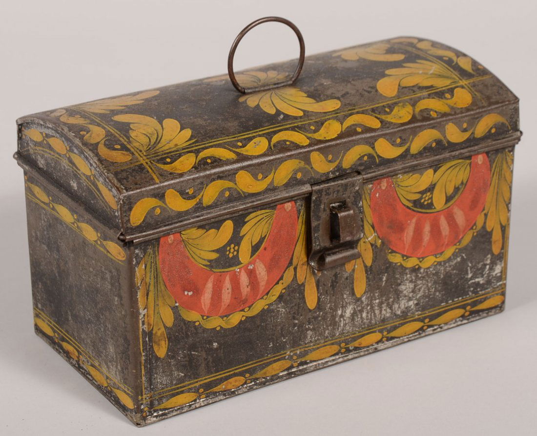 Tole Painted Arched Lid Tin Document Box. Rectangular b: Tole Painted Arched Lid Tin Document Box. Rectangular box with arched top lid having a ring handle and two piece hinged latch. Lid decorated with yellow foliate designs and box with same and red swags