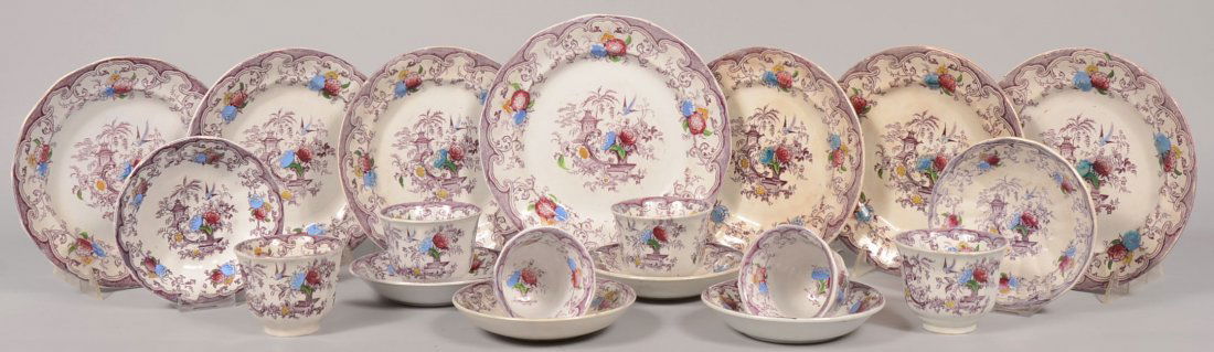"Florilla" Purple Transfer Ironstone Dinnerware. All pi: "Florilla" Purple Transfer Ironstone Dinnerware. All pieces with blue, red, yellow and green hand painted accents to pattern. One 9 3/4"dia. plate; six 8 3/4"dia. plates; six similar dished saucers, 6