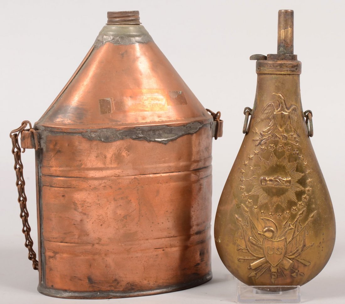 Brass Powder Flask and Copper Lamp Oil Can. 19th centur: Brass Powder Flask and Copper Lamp Oil Can. 19th century copper oil canister with screw cap and iron carrying chain. 9"h. Along with a reproduced Civil War era powder flask with shoulder strap. 9"l. C