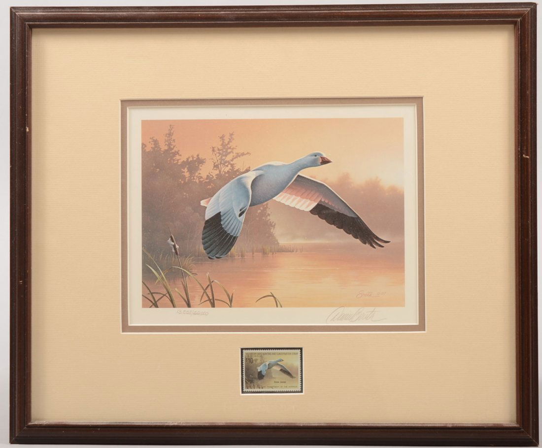 Framed Federal Migratory Bird Stamp and Print. Issued b: Framed Federal Migratory Bird Stamp and Print. Issued by U.S. Dept. of Interior this stamp and print are of a Snow Goose. Print, 13,558 of 22,000 is signed by artist David Smith, 1987 for the 1988-'89