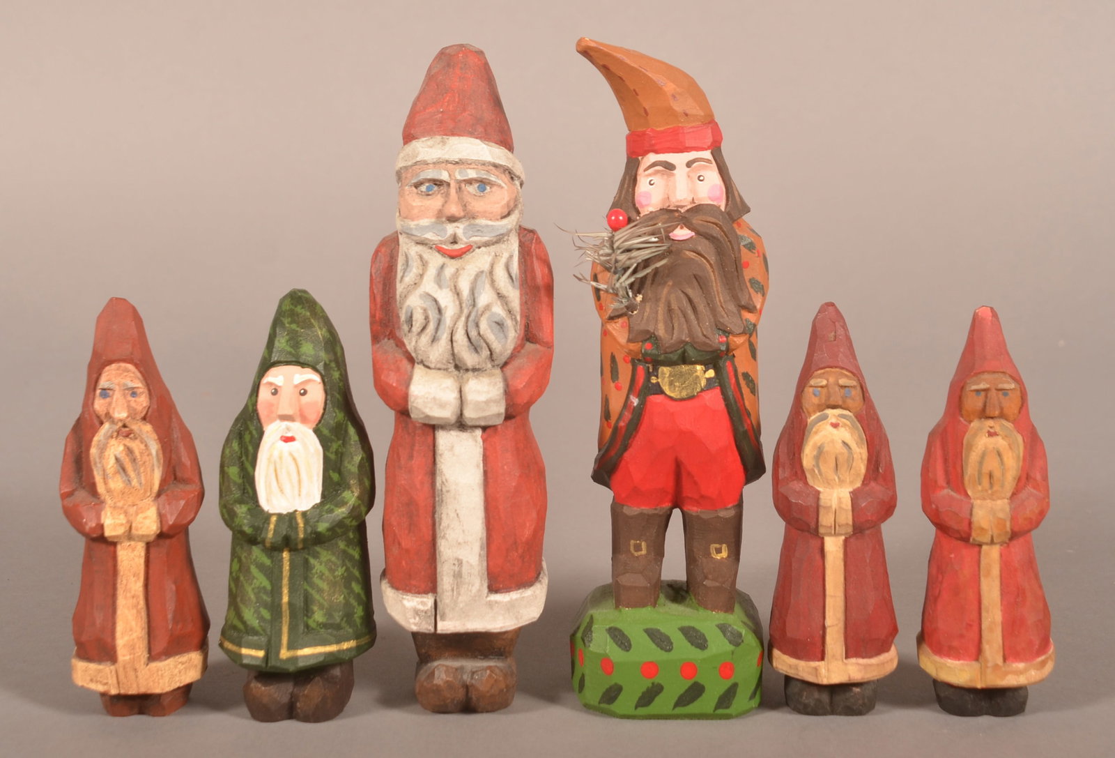 Six J. Bastian Folk Art Santa Carvings.: Dated 1985,1988, 1989 and 2003. (1 is unsigned). 4-1/4"H to 7" H