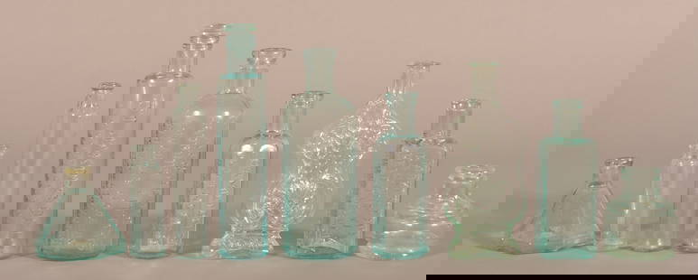 Nine Various Antique Aqua Bottles and Inkwells.: Including Hire's Root Beer, shell and scroll bottle, Atwood's Bitters, Hamilton's Old English Oil, and more. Tallest, 7" H