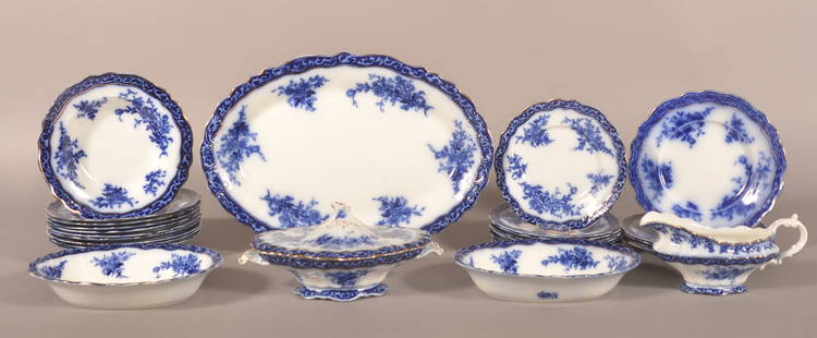 Lot of "Touraine" Pattern Flow Blue China.: Made by Henry Alcock & Co. Nine 8-3/4" soup plates, four 8-3/4" luncheon plates, eight 7-3/4" salad plates, two 9-3/4" open vegetable bowls, 10-1/2" covered vegetable bowl, 8" gravy boat, and a 17" pl