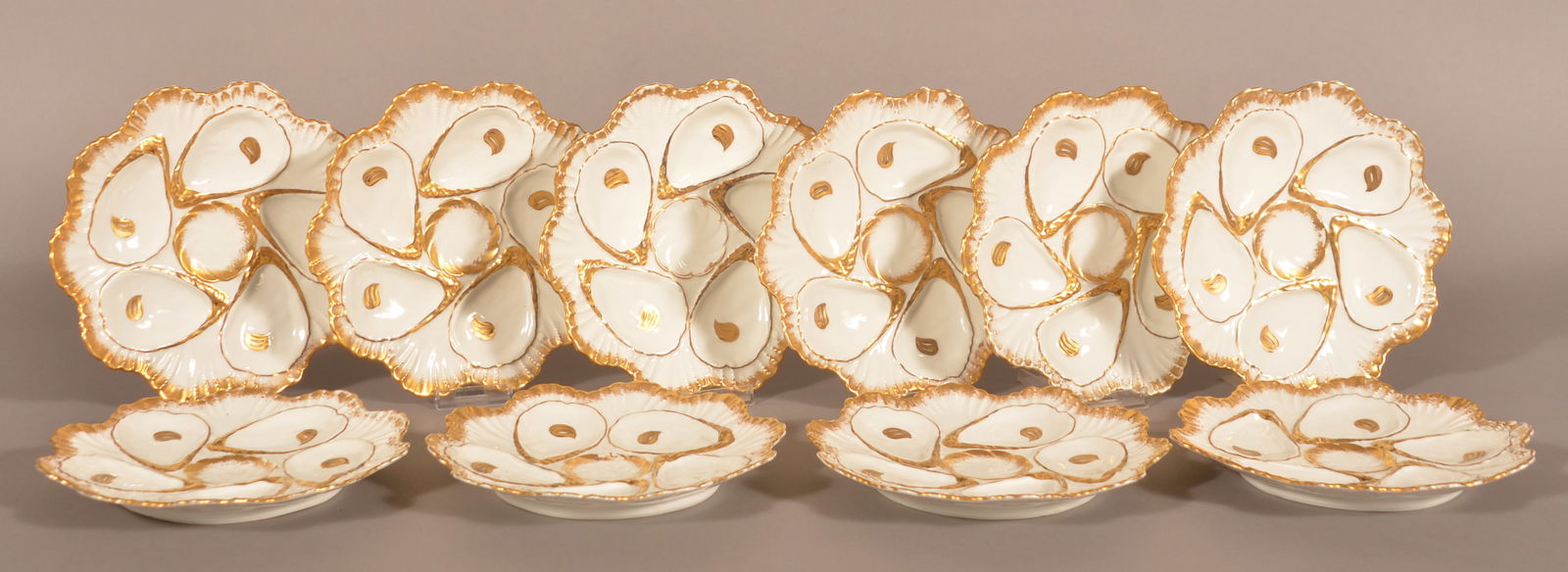 Ten Antique Gold-Painted Porcelain Oyster Plates. (1 of 2)
