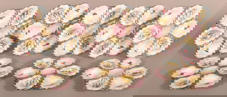 Eight Antique Hand-Painted Porcelain Oyster Plates.: Illegible blue mark with polychrome paint, six oyster wells and center sauce receptacle. 9-1/4" diam.