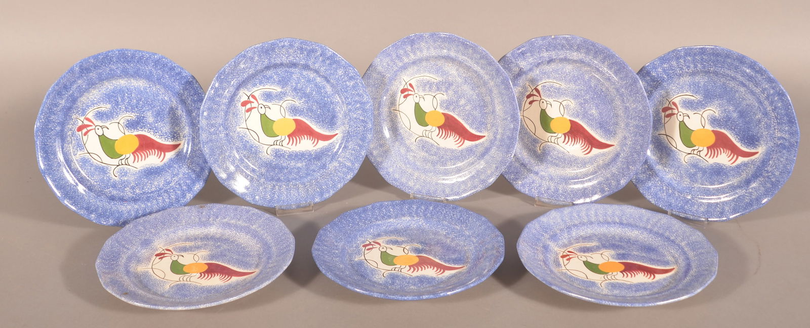 Eight Mary E. Weaver Reproduction Spatter Plates. (1 of 2)