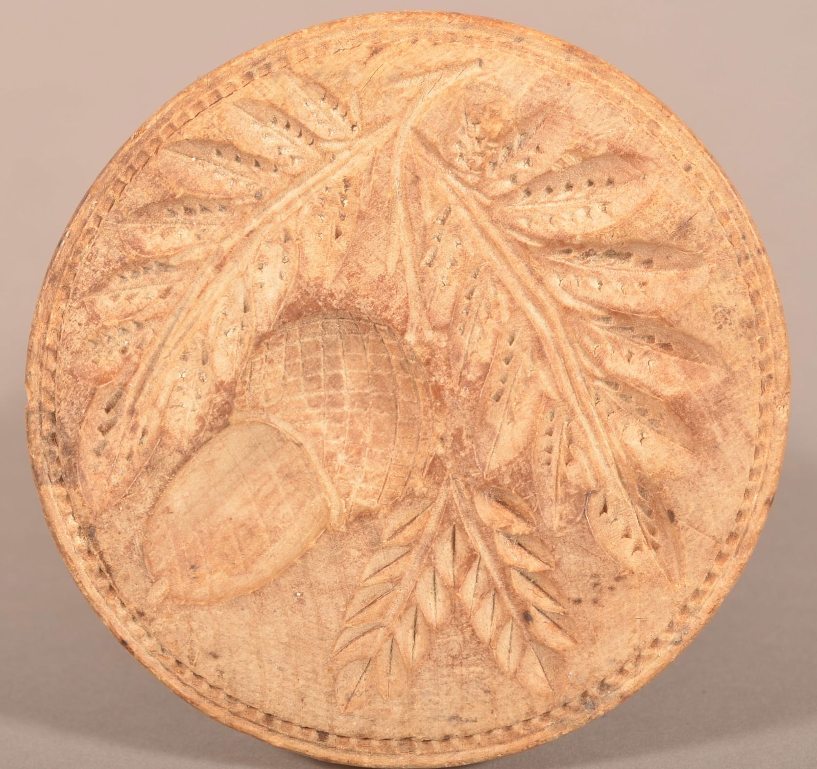 Antique Carved Hardwood Acorn Butter Print.: Turned with applied tapered handle. 4" H x 3-7/8" diam.