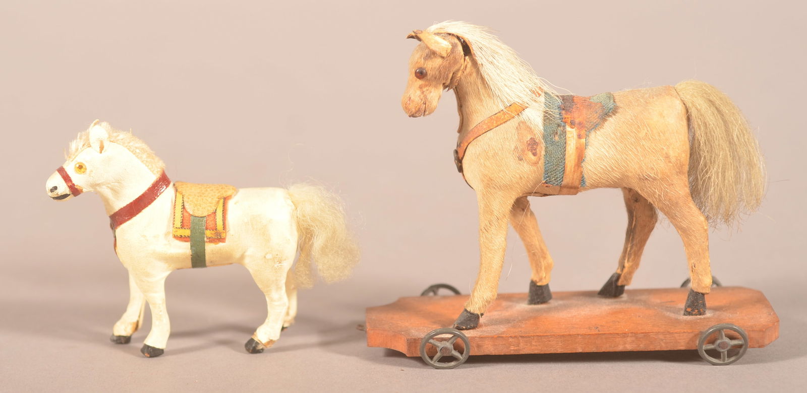 Two Antique Miniature Hide Covered Horse Toys.: Probably German-made, fine quality, larger is a pull toy. 2-1/4" H x 2-1/2" L x 3/4" W and 3-1/4" H x 4" L x 1-3/4" W