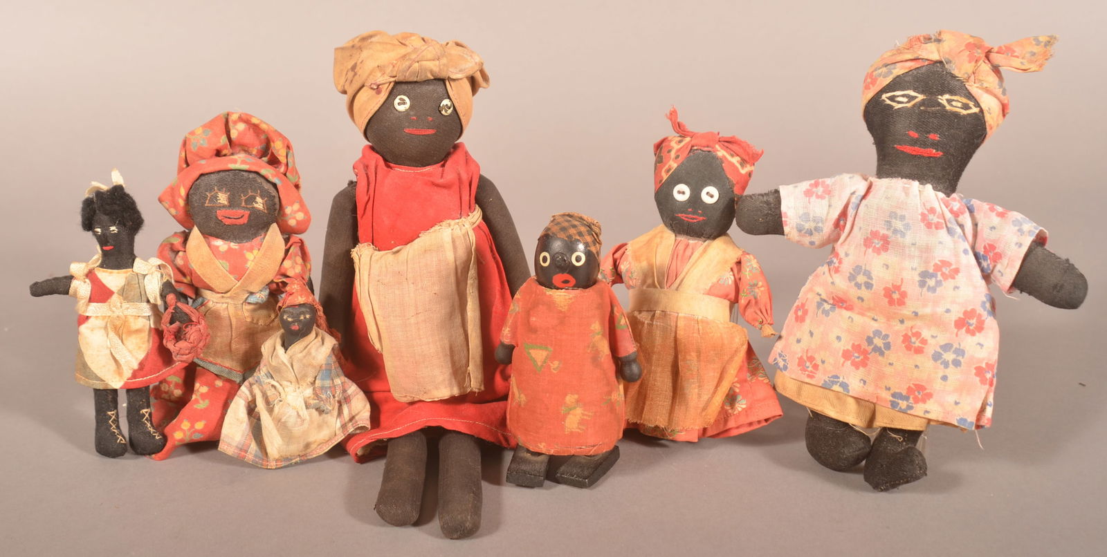 Seven Vintage Folk Art Black Americana Dolls. (1 of 2)