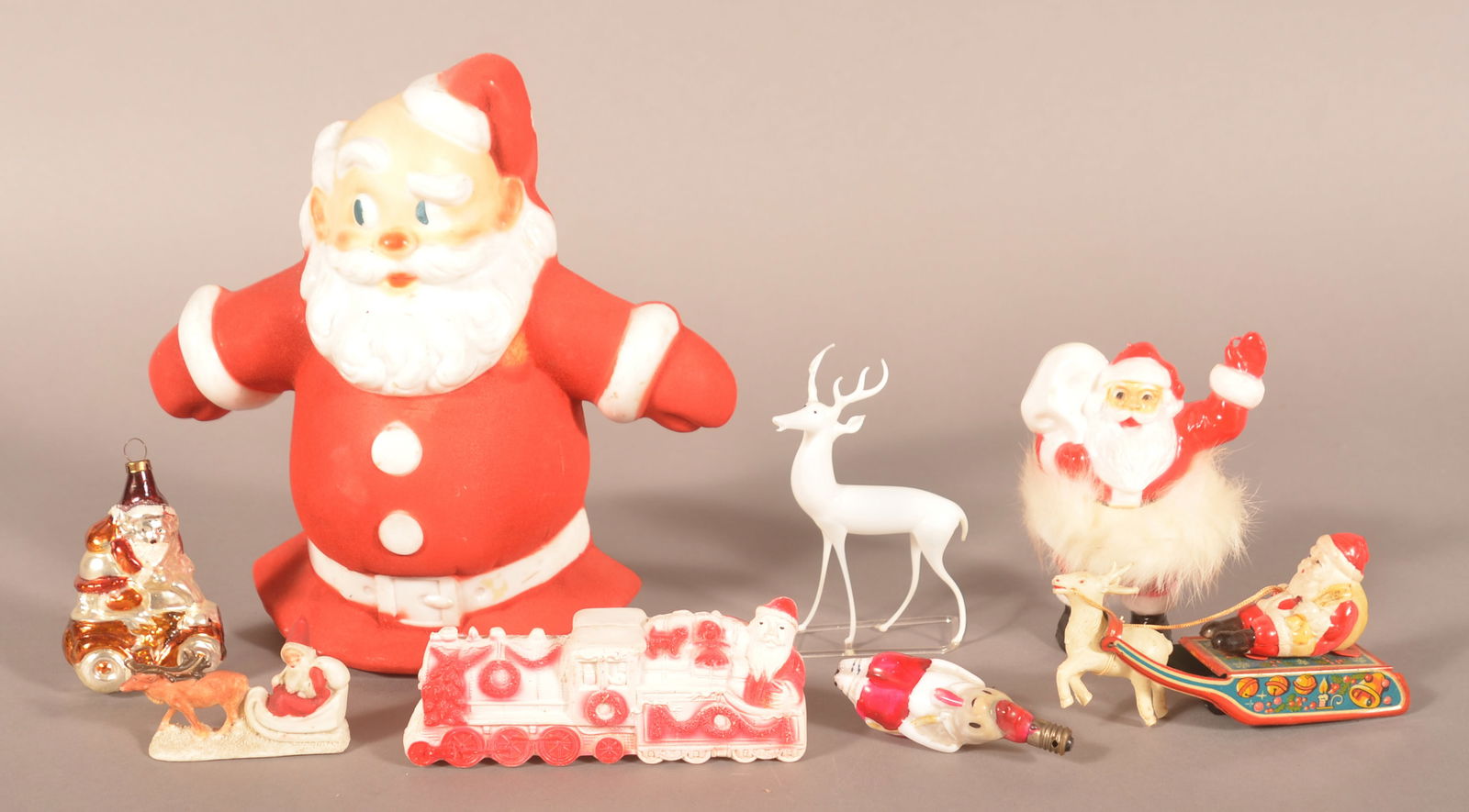 Various Vintage Christmas Novelties.: Including celluloid Santas, German bisque Santa in sleigh and various decorations. Largest, 8"H x 8-1/2" W x 2-1/2" D