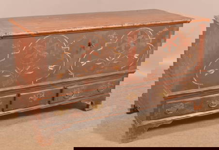 Pennsylvania Paint-Decorated Softwood Dower Chest.: Last quarter 18th century. Decorated with stylized clover leaf panels, molded lid, interior till with secret compartment, shaped wrought iron strap hinges with penny ends, wrought iron jaw lock, dovet