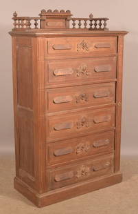 Victorian Walnut Side Lock Gentlemen's Chest.: Spindle gallery, molded top, six full-width, carved front dovetailed drawers with burlwood pulls and molded base. 64" H x 37" W x 19-1/4" D