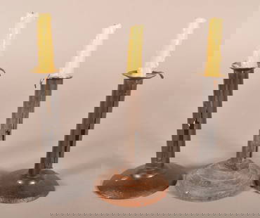 Three Antique Sheet Iron Candlesticks.: Two hogscraper-type and one with a turned wood base. All have hanging hooks. 6-1/2" H x 4" diam.