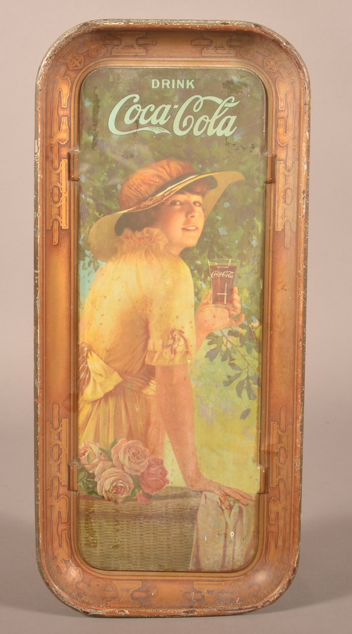 Coca-Cola 1916 Tin Litho "Miss Elaine" Tray.: Also known as WWI girl, wearing a yellow dress and holding a glass of coke. 19" H x 8-1/2" W
