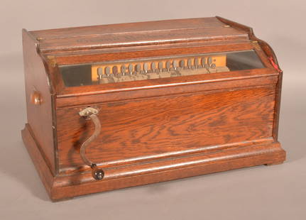 Oak Case Grand Roller Organ.: With one grand roller organ cob. 13-1/2" H x 25" W x 16" D