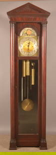 Colonial Mfg. Co. Mahogany Tall Case Clock.: Zeeland, Michigan. 8-day chiming movement, brass dial with moon phase. 91-1/2" H x 26-1/4" W x 17-1/4" D
