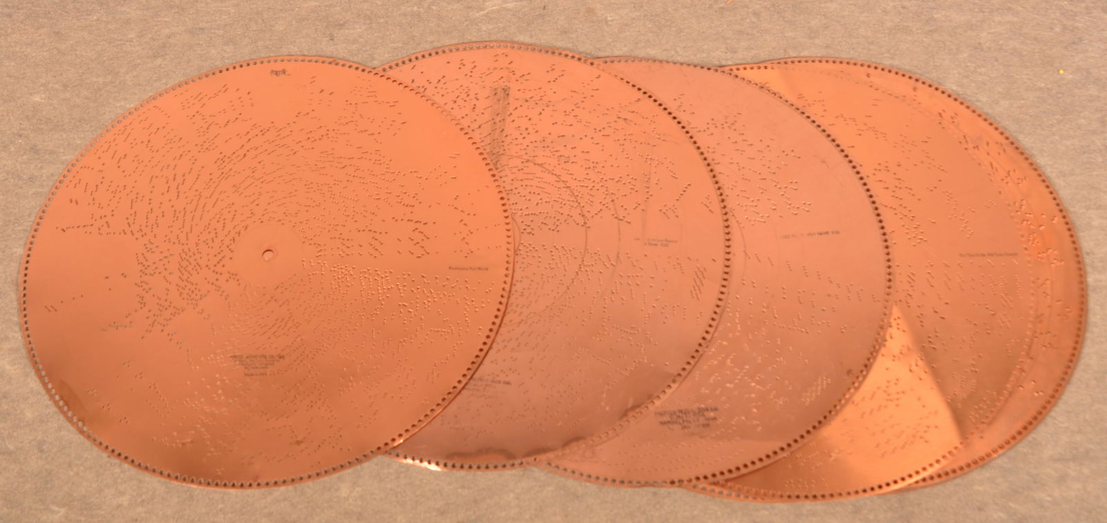 Lot of 13 Porter 26-3/4" Copper Music Discs. (1 of 2)