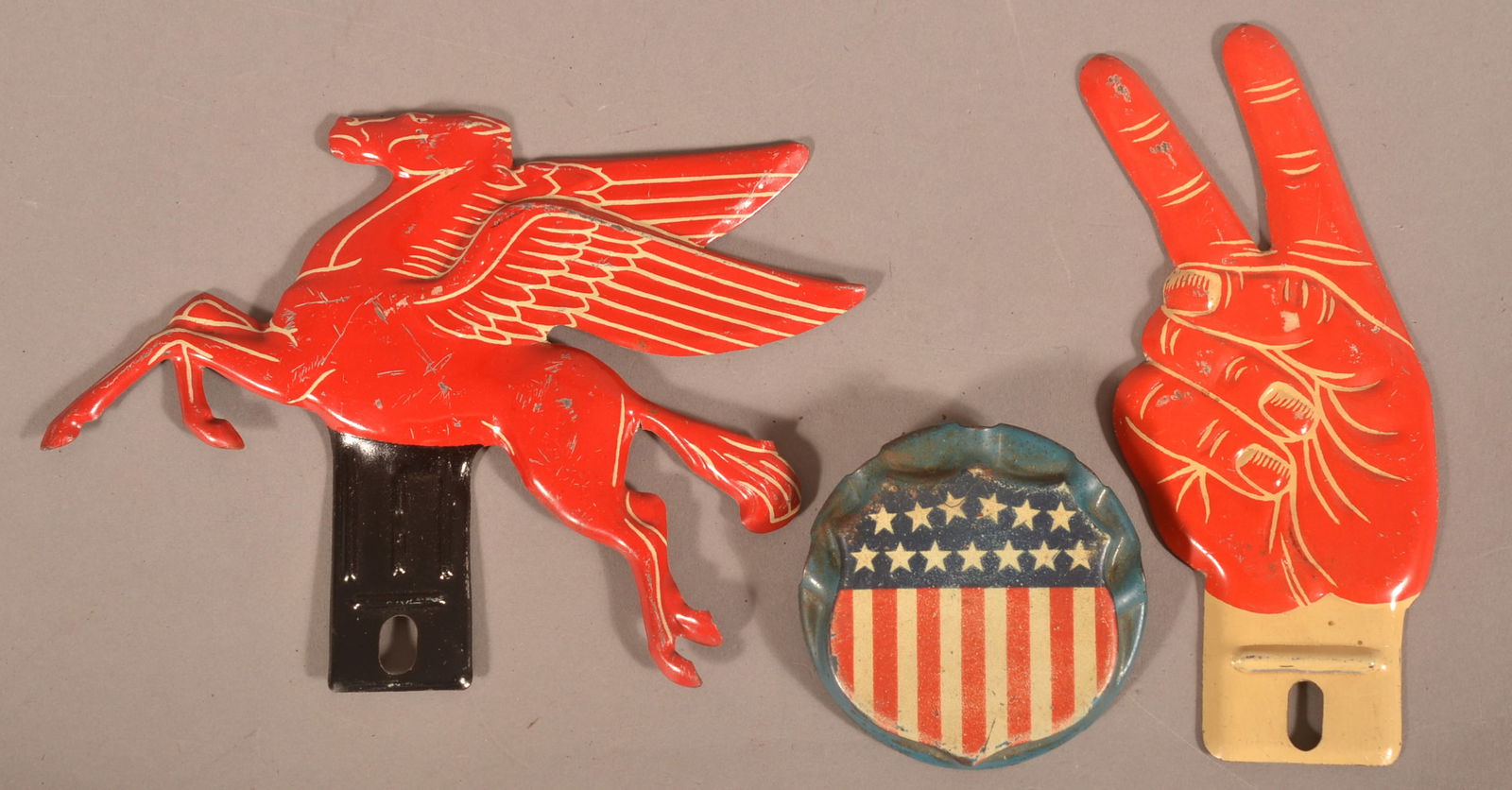 Three Vintage Pressed Metal License Plate Toppers. (1 of 5)