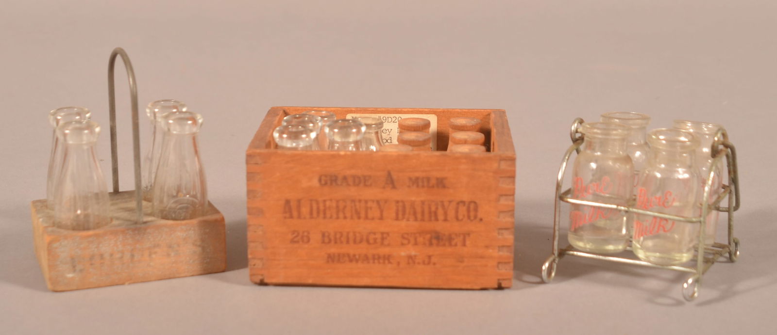 Salesman Sample Milk Bottles and Carriers. (1 of 3)