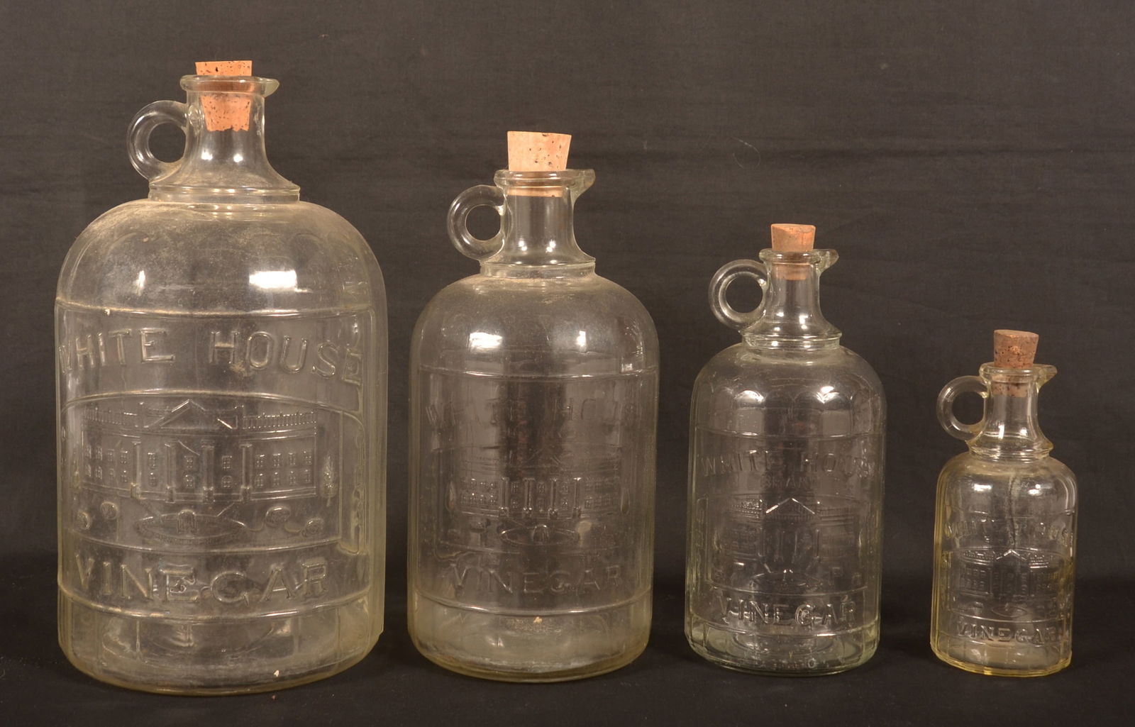 Set of Four Glass White House Vinegar Jars. (1 of 2)