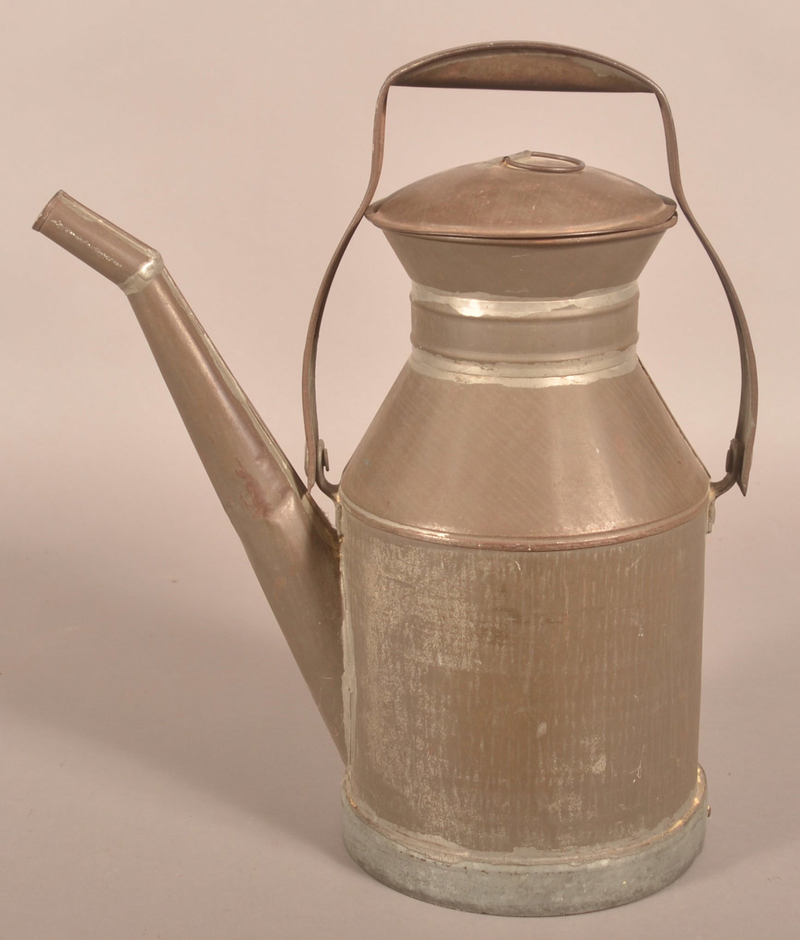 Wonderful Tinsmith-Made Milk Container.: Ca. 1890. Large container with reinforced handle and angled spout. Very nicely made. 16" H x 15" W x 8-1/4" D (without handle)