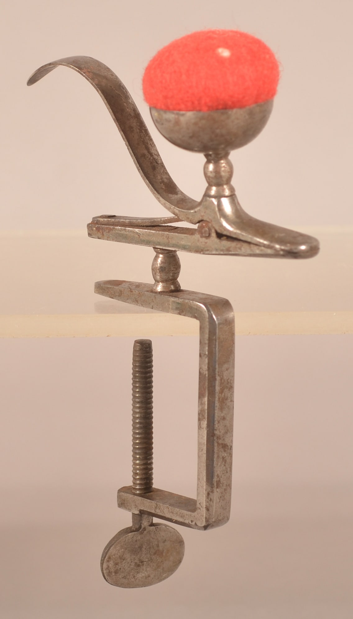 19th Century Metal C-Clamp Pin Cushion.: Polished steel with fabric clip. 5-1/2"h. x 3-1/2"w.