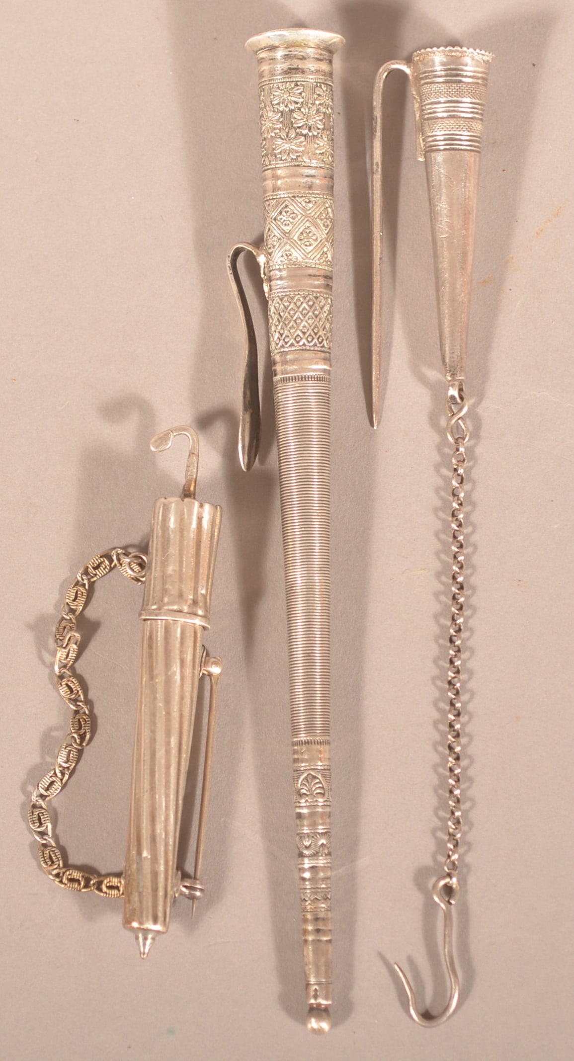 Three Antique Silver Pin-On Needle Cases.: Various European touchmarks. 44 grams total. Largest, 6-1/2"l.