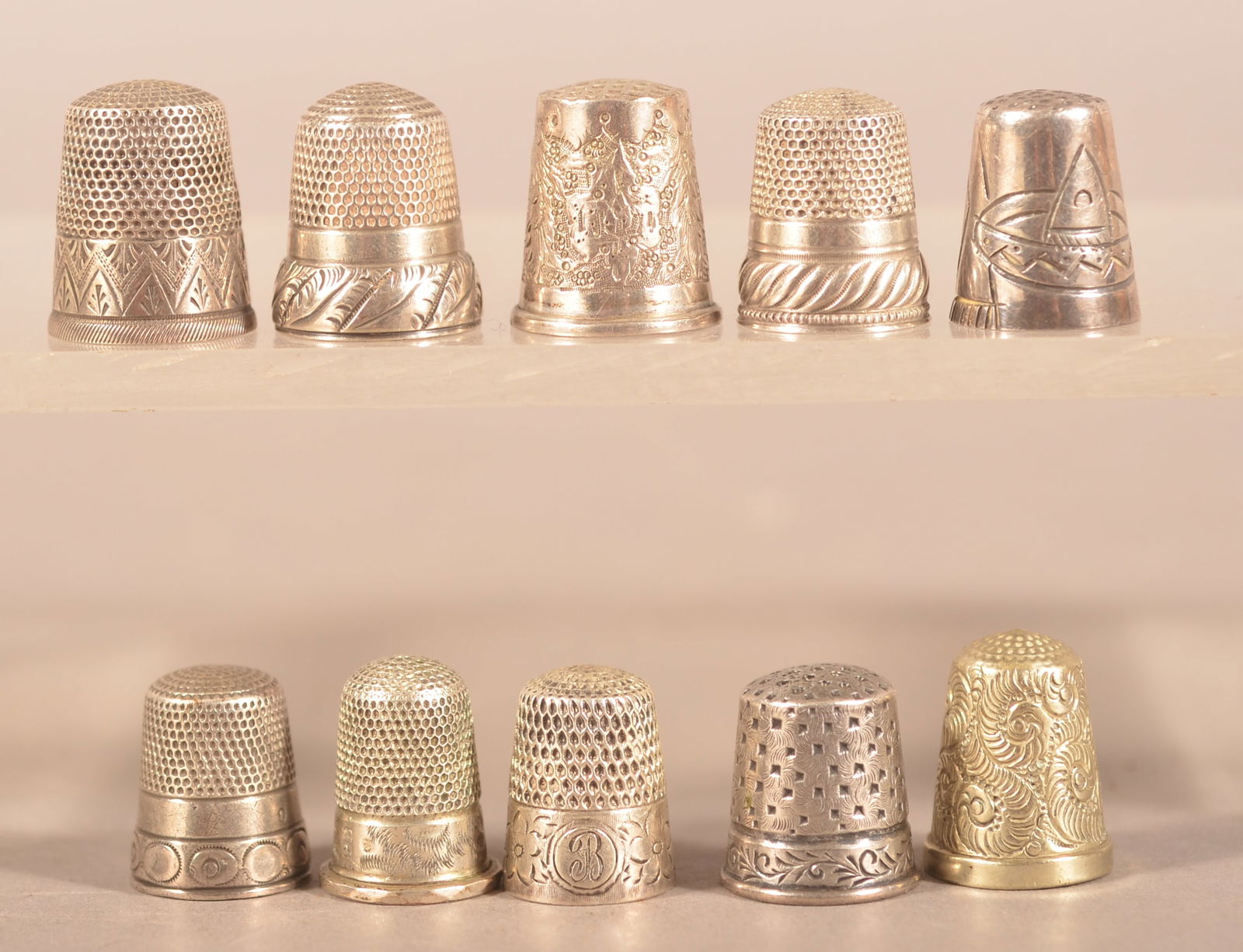 Ten Various Antique/Vintage Silver Thimbles.: Some with cast or engraved designs. Average 3/4"h.