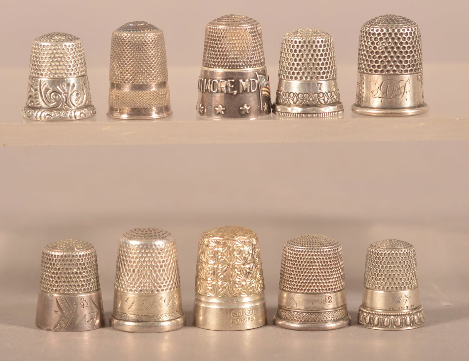 Ten Various Antique/Vintage Silver Thimbles.: Some with cast or engraved designs. Average 3/4"h.