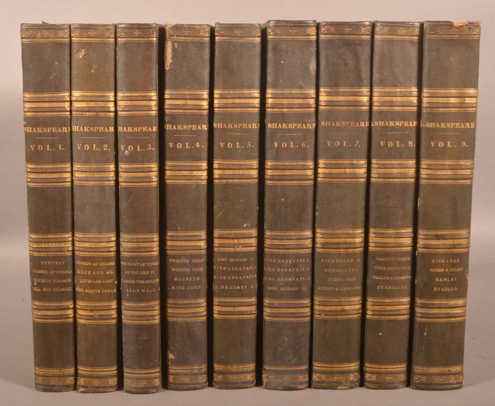 9 Folio Volumes of Shakespeare.: (9 volumes) The Dramatic Works of Shakespeare. Revised by George Steevens. London: W. Bulmer, 1802. Full green morocco, spines gilt. Spine numbers to volumes 2 and 3 are switched. Folios. 13 x 17".