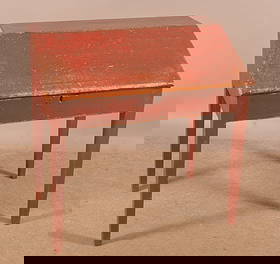 PA Country Hepplewhite Softwood Slant-Lid Desk.: Red painted schoolmaster's-style desk with three split interior drawers and tapered legs, 33-3/4"h. x 34"w. x 21"d.