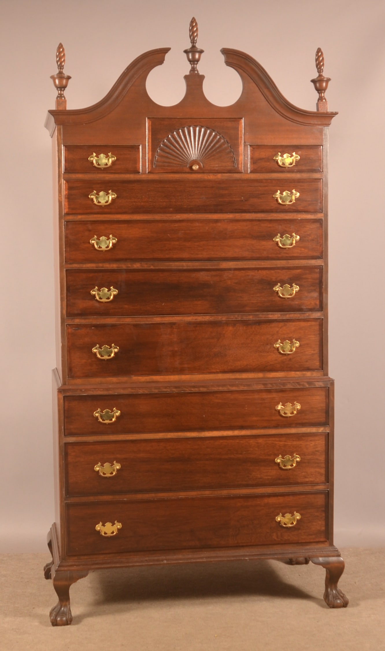 Chippendale-Style Mahogany Chest-on-Chest.: Factory-made with broken arch pediment, urn-turned finials and shell-carved central drawer. 90"h. x 43-1/4"w. x 24"d.