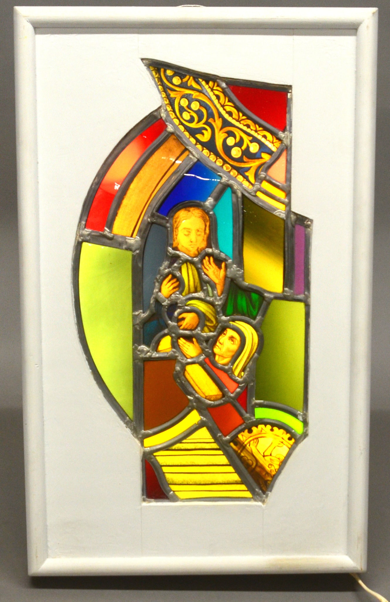 Rare Leonids Linauts Stained Glass Window Collage.: (Leonid Linauts, Latvian/American, 1914-1998). A light box depicting shards of 16th century stained glass. Signed and identified on the reverse. Circa 1960. 26" x 16" x 3-1/2 deep.