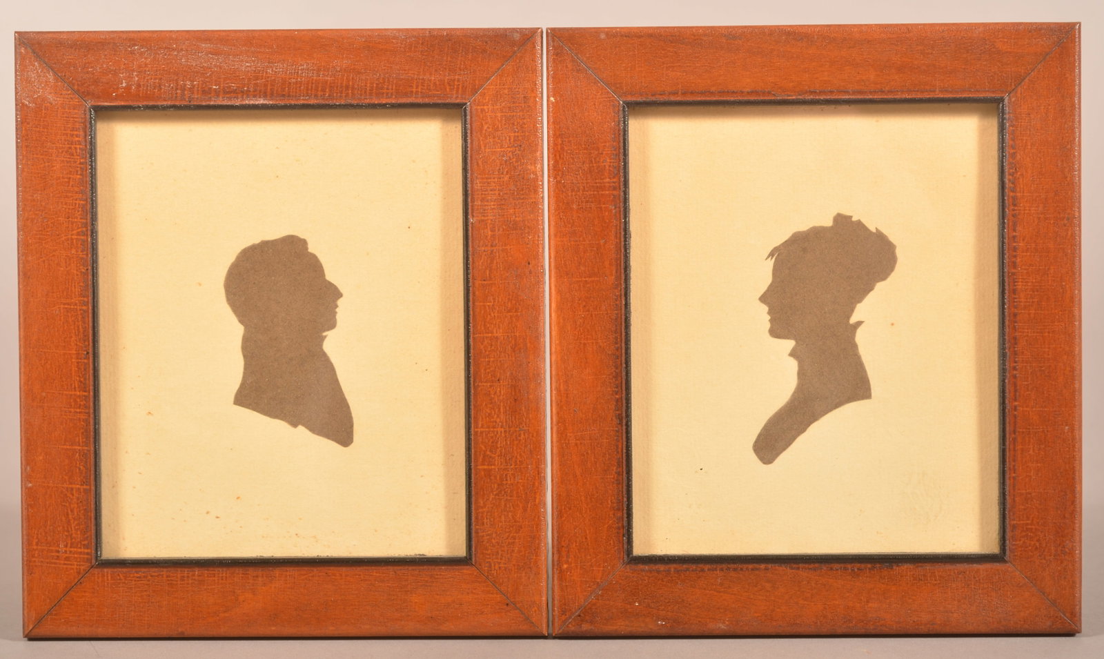 Pair of 19th Century Cut-Work Silhouttes.: Shoulder-length profiles of a gentleman and lady (presumably man and wife). In matching period, mitered mahogany frames. 7-5/8" x 6-1/2" overall.