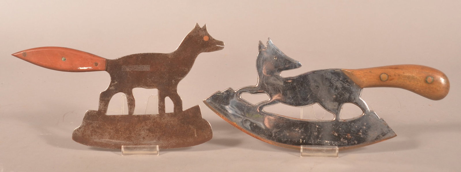 Two Antique Fox Silhouette Cleavers.: Both having wood handles fitted on tails. Largest, 5-1/2"h. x 13"l.