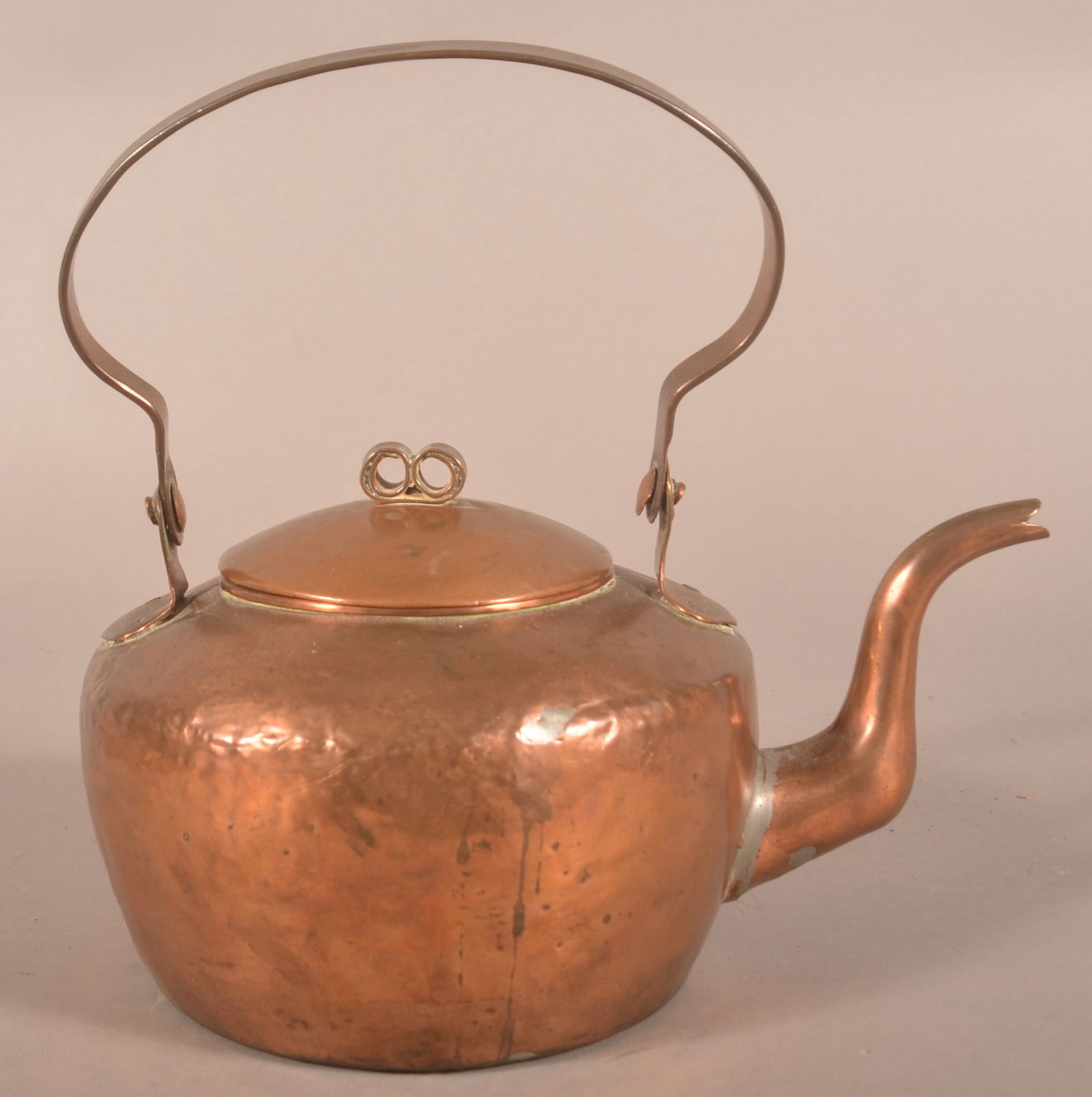 I. Dunn New York, NY Copper Tea Kettle.: Active 1790 to 1823, arched swing bail handle, double scroll finial on convex lid, gooseneck spout, and crimped-seam tab construction. 11-1/2"h. overall.