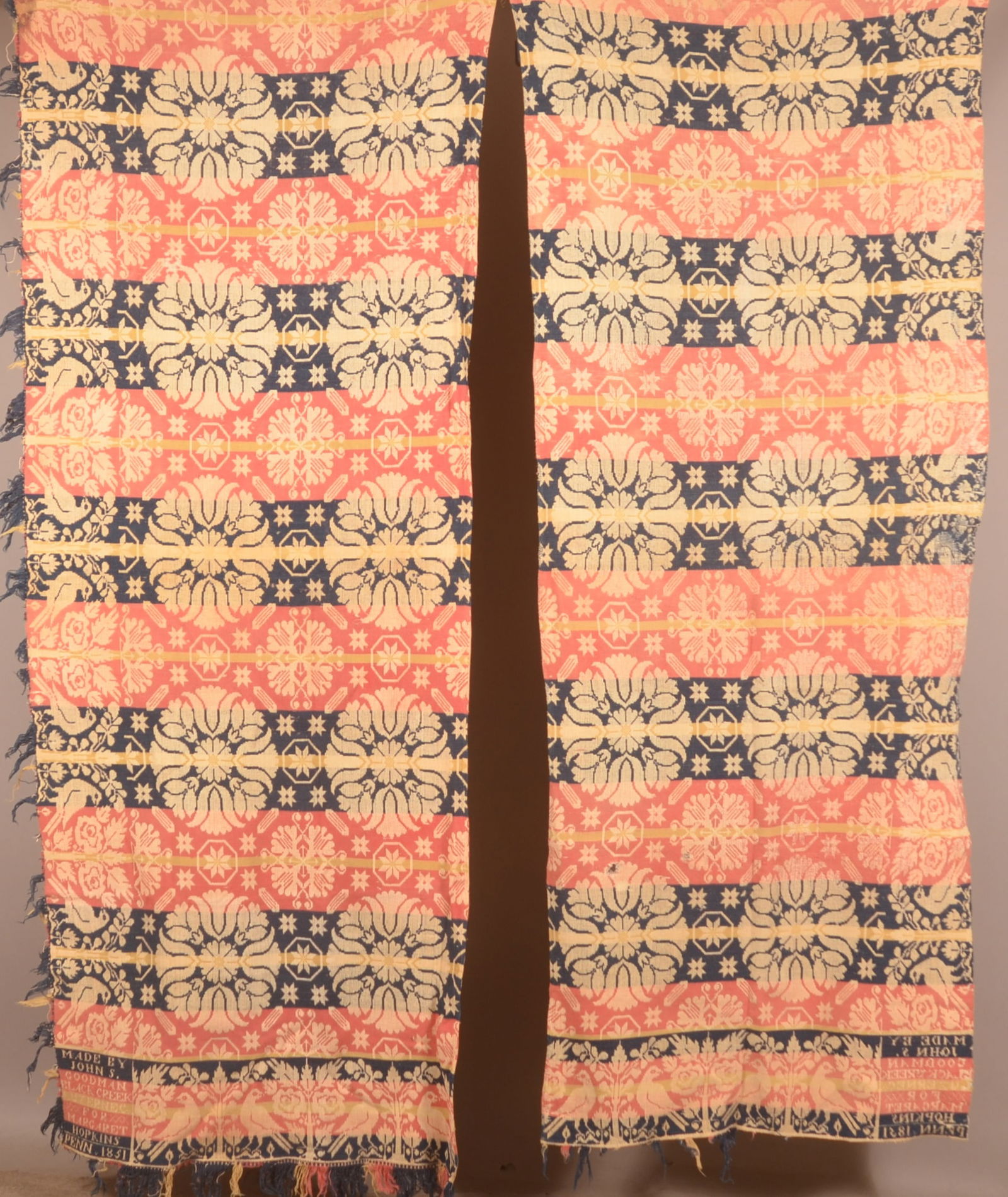 1851 John Goodman Black Creek Signed Coverlet.: 4-color, 2-piece coverlet woven by John Goodman in Luzerne County, Pennsylvania for Margaret Hopkins. Signed in lower corners. 91"h. x 69"w.