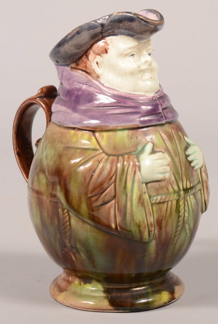 337. Majolica Glazed Earthenware Monk Form Toby Jug. 8 : 337. Majolica Glazed Earthenware Monk Form Toby Jug. 8 1/4" high. Condition: Good with minor glaze wear on spout.