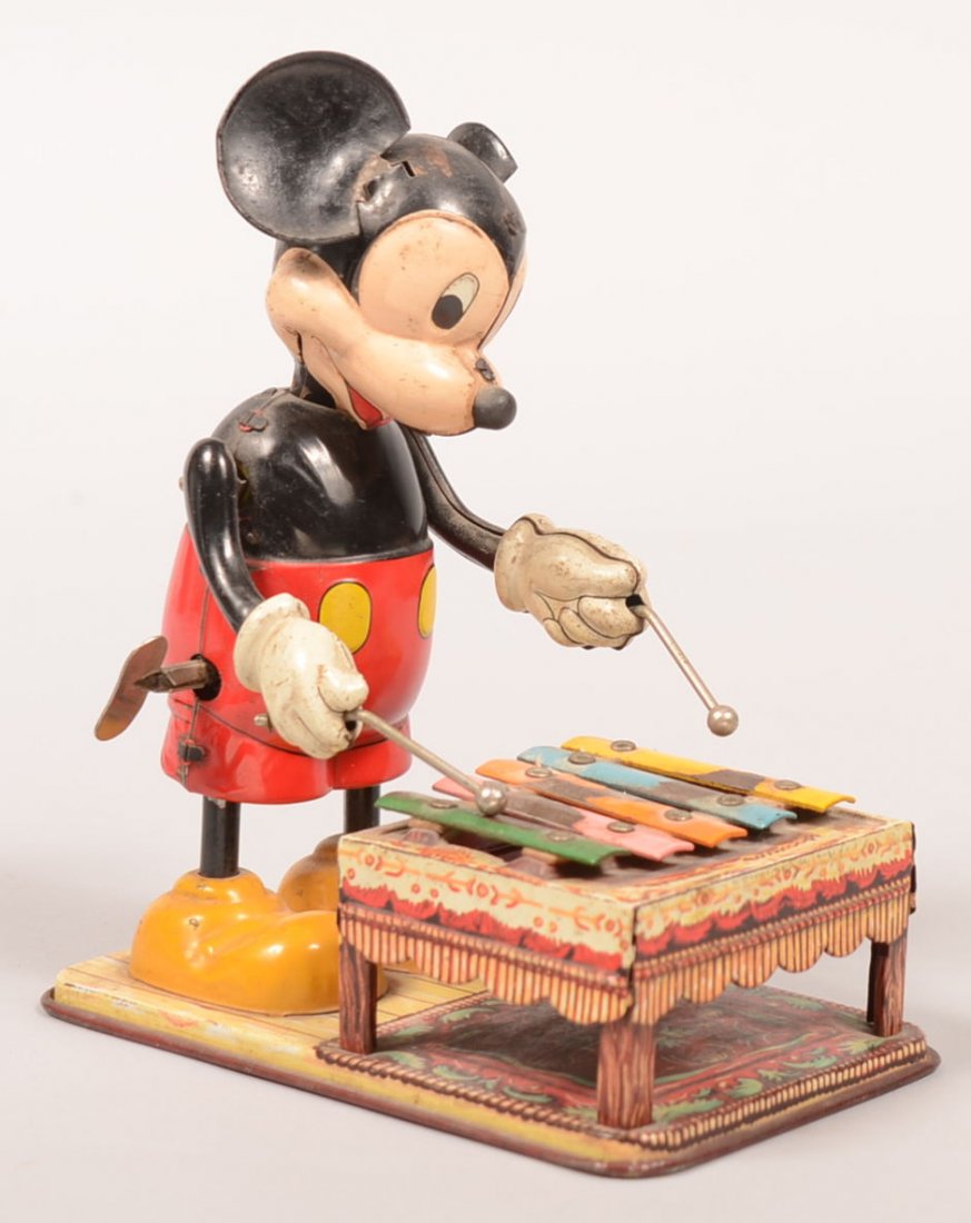 455. Line Mar Toys (Japan) Tin lithograph Wind-up Micke: 455. Line Mar Toys (Japan) Tin lithograph Wind-up Mickey Mouse Xylophone Player. Copyright Walt Disney Productions. 6 1/2" high. Condition: Good with wear, working condition.