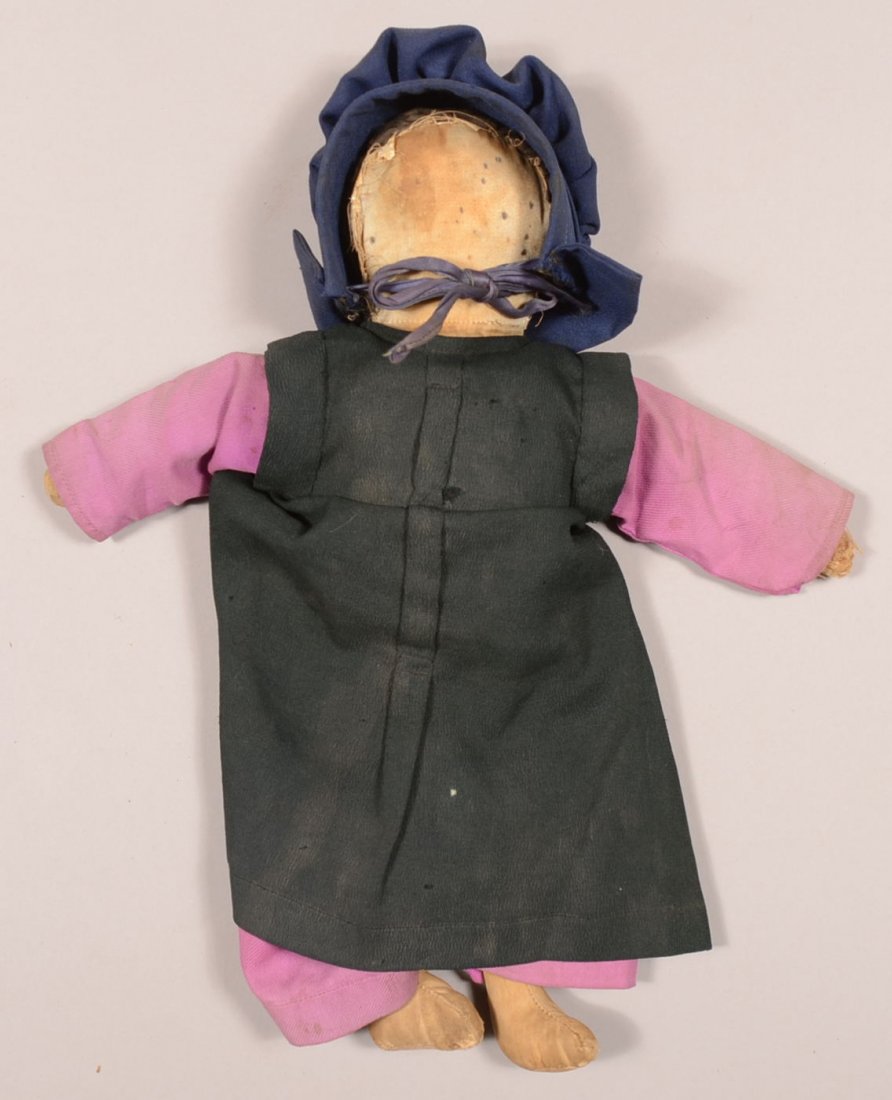 461. Vintage Hand Made Amish Girl Doll from Big Valley,: 461. Vintage Hand Made Amish Girl Doll from Big Valley, Bellville, Mifflin Co., PA. Stuffed cloth body with original clothes. 15" high. Condition: Good with use wear.