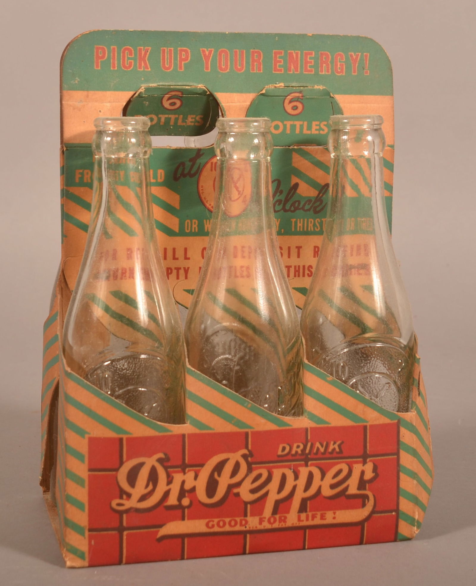 Early Dr. Pepper Cardboard Carrier & Bottles.: Nice colors and graphics with makers mark from Fort Worth, Texas on underside of bottom. Complete with six embossed bottles with maker's mark from the bottler in Reading, PA with "10-2-4" logo on reve