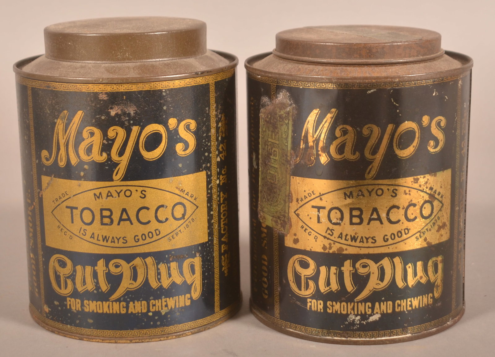 Mayo's Tobacco 1 lb. Tins "Oatmeal & Rice".: Very good color, strong gold litho, each with remnants of tax stamps. Each 6-1/4"H x 4-3/4"D